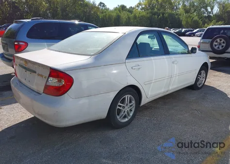2003 Toyota Camry Le from USA, damaged, VIN 4T1BE32K63U164890